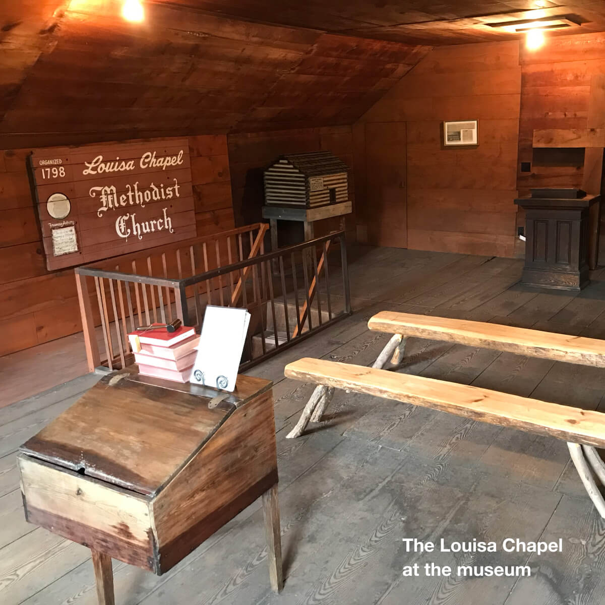 Photo of the ‘Louisa Chapel’ at the Museum of Haywood County History, which is located in the attic of the museum and contains early 1800’s-era pulpit and bench replicas